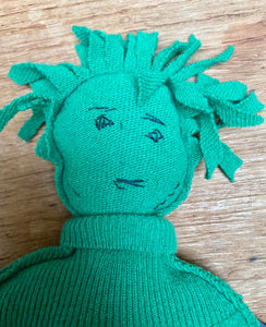 "The Confused One" character made of a green pullover