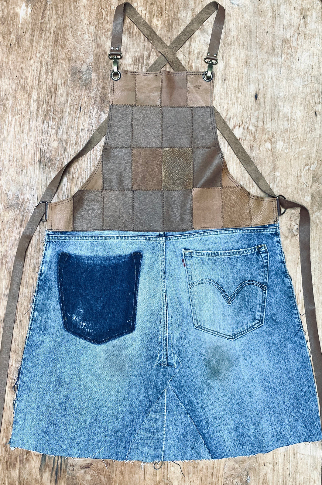 Upcycled leather, Levi denim fabric. The fully recycled handmade apron.