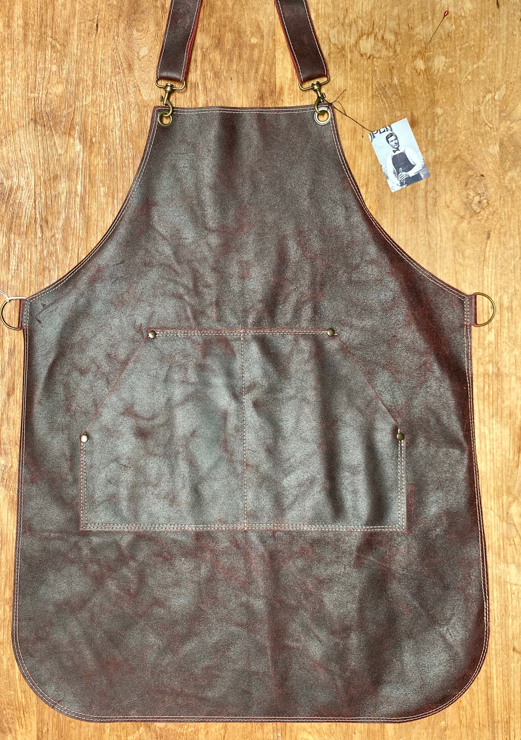 Leather apron in red.