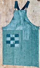 Load image into Gallery viewer, Up cycled green leather, green denim fabric. The fully recycled handmade apron.