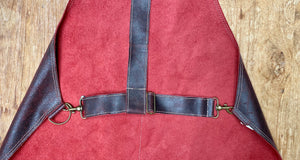 Leather apron in red.